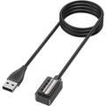 Black USB watch charger for Suunto watches, including Suunto 9, Ambit 4, Spartan, and D5, with USB-C cable for charging.