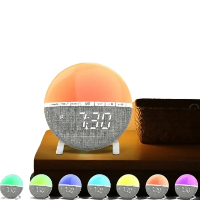HBC Wake-Up Light Sunrise Alarm Clock by 9eight5 with sunrise simulation and digital display on a bedside table.