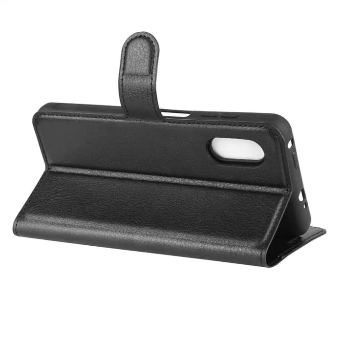 Black 9eight5 wallet case for Samsung Galaxy Xcover Pro, with card slots and protective cover for phone security.