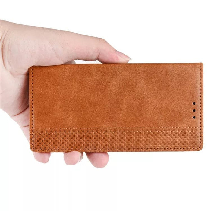 Brown 9eight5 wallet case for Samsung Galaxy Xcover Pro, with card slots and secure phone protection.