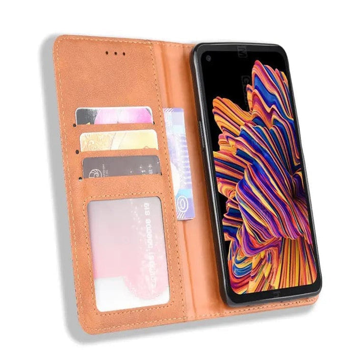 Brown 9eight5 wallet case for Samsung Galaxy Xcover Pro, featuring card slots and protective phone cover design.