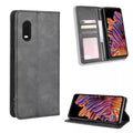Grey 9eight5 wallet case for Samsung Galaxy Xcover Pro, featuring card slots and protective cover for the phone.