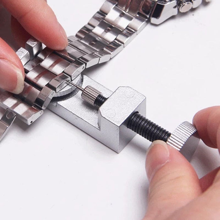 Watch link remover tool from That Watch Shop, used for adjusting and resizing watch bands with precision.