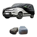 Black Habicare HBC waterproof all-weather outdoor car cover on a Fiat Panda, designed to protect against rain and outdoor elements.
