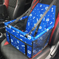 Blue waterproof pet car seat cover with paw and bone pattern, designed for cats and dogs to protect car seats during travel.