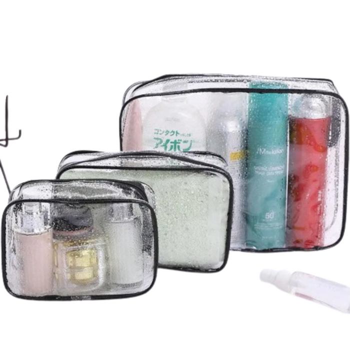 Three transparent waterproof cosmetic bags with zippers in different sizes by Habicare, ideal for travel and organization.