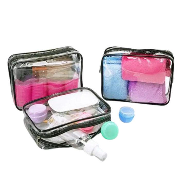 Transparent waterproof cosmetic bag by 9eight5 Habicare with zipper, shown in clear view with multiple sizes available.