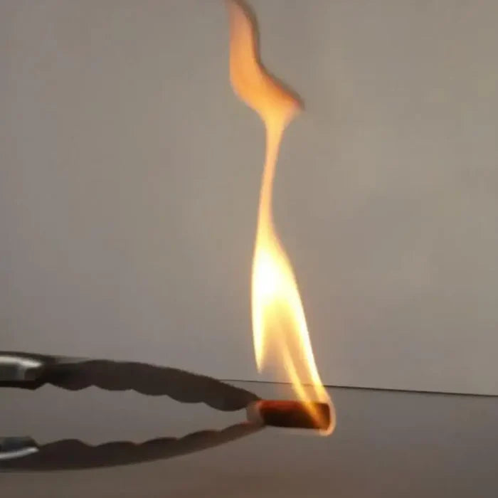 Habicare SS wax braided paraffin swabs used outdoors for camping, survival, and fire-starting, shown as a fire-starting tool.