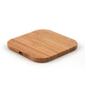 9eight5 wireless charger on hardwood and plywood surface, designed for phone and tablet charging accessories.