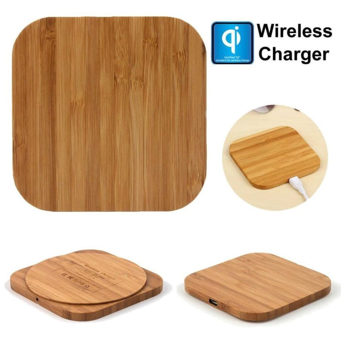 9eight5 wireless charger for phones and tablets resting on a hardwood surface with a varnish finish.