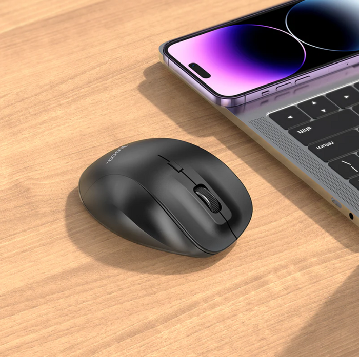 Wireless Bluetooth mouse by TechPlus with adjustable DPI and 2.4G connectivity, shown in a sleek black design.