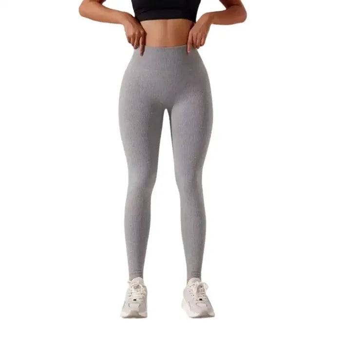 Women’s high-waisted seamless leggings by Habicare in three colors, shown in various sizes on a model.