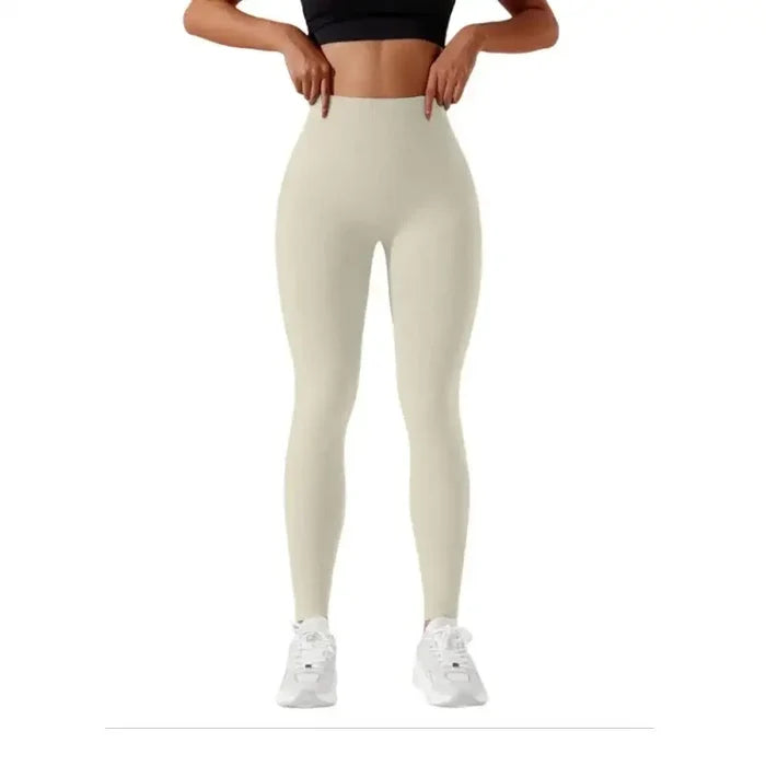 Women’s high-waisted seamless leggings by Habicare in three colors, showing a close-up of the fit and stretchy fabric.